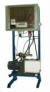Vacuum decay leak testing systems with gas filling